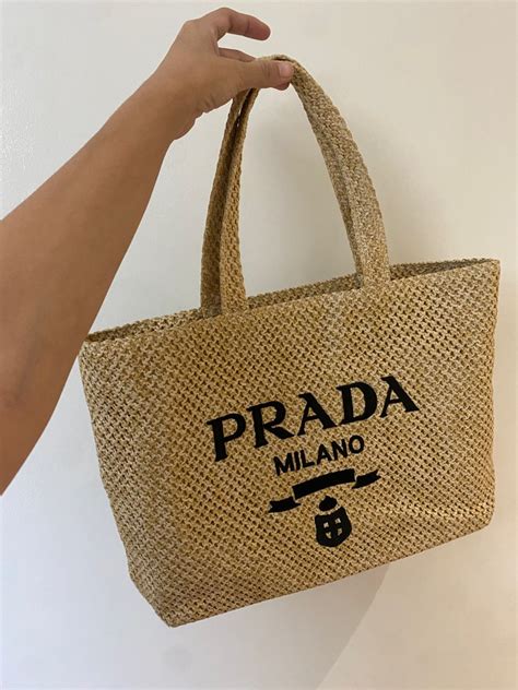 prada beach bag second hand|Prada wicker tote bag.